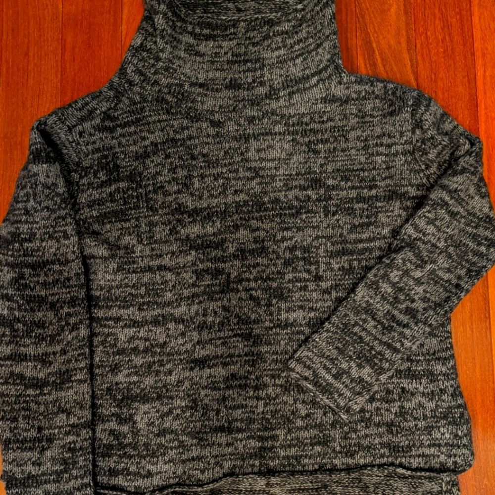 An Eileen Fisher variegated yak and merino wool sweater with cowl neck